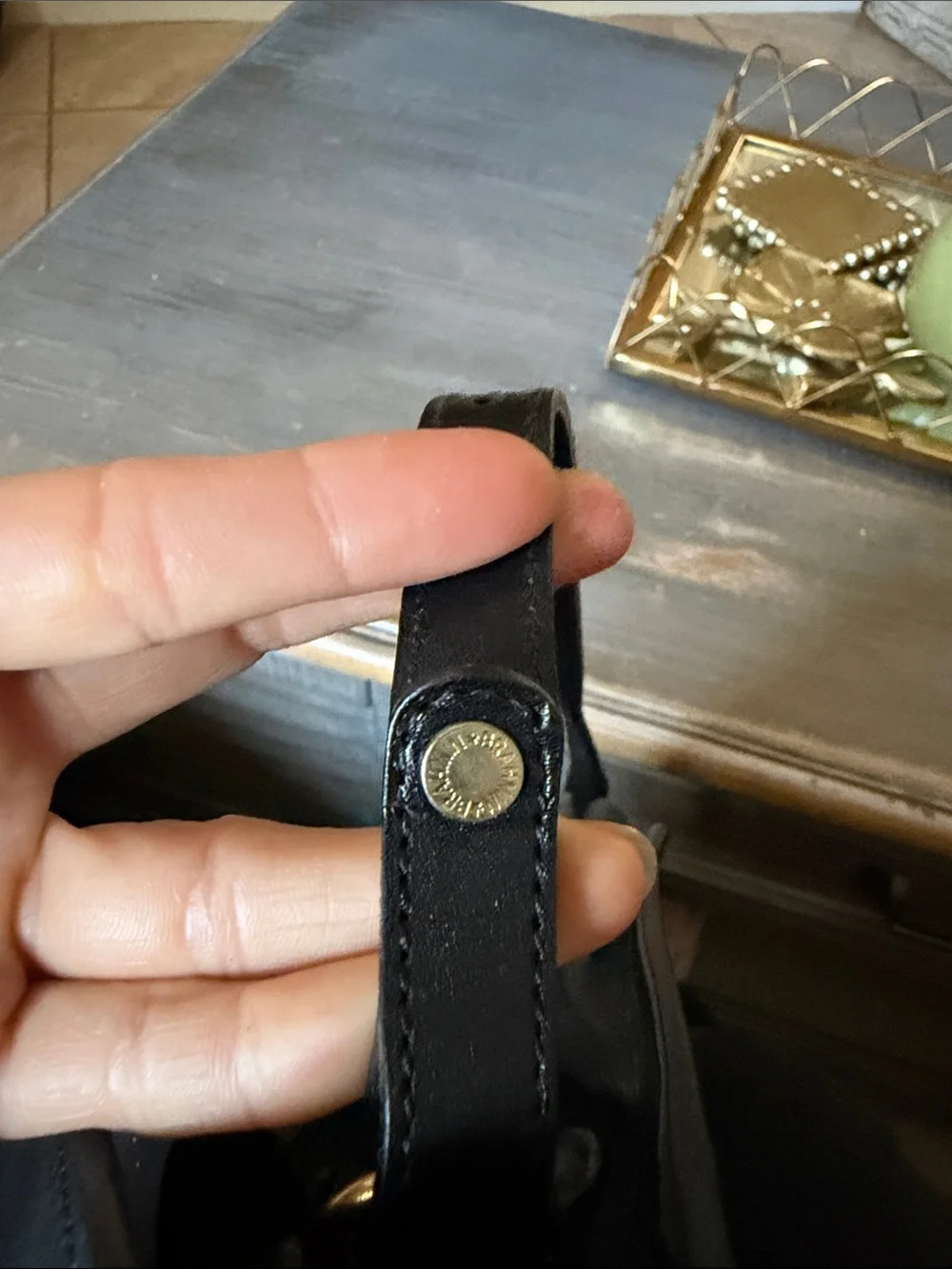Brahmin Black Leather Messenger Bag with Gold Medallion